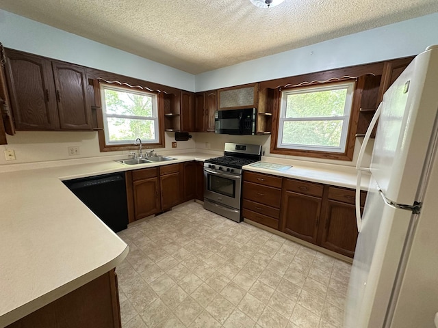 14390 Sperry Lake Rd, Harrison Twp, MN 56209 - kitchen featuring open shelves, black appliances, a sink, a textured ceiling, and light countertops