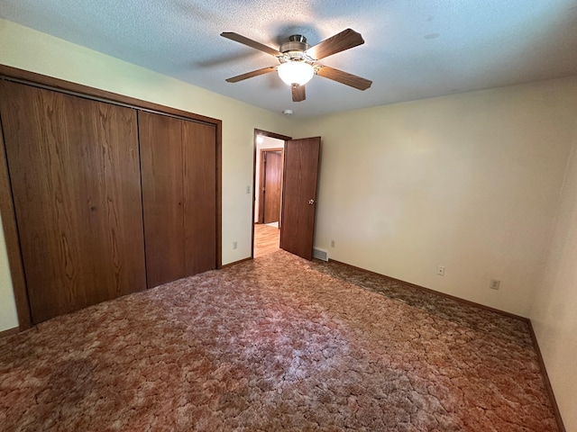 14390 Sperry Lake Rd, Harrison Twp, MN 56209 - unfurnished bedroom featuring carpet, a closet, and a ceiling fan