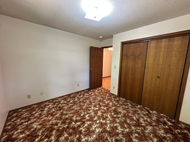 14390 Sperry Lake Rd, Harrison Twp, MN 56209 - unfurnished bedroom with a closet, carpet flooring, and a textured ceiling