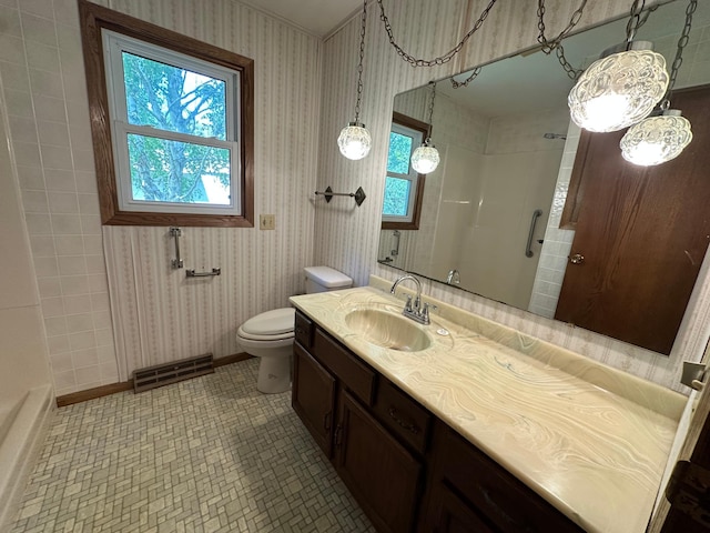 14390 Sperry Lake Rd, Harrison Twp, MN 56209 - full bathroom with a shower, baseboards, vanity, toilet, and wallpapered walls