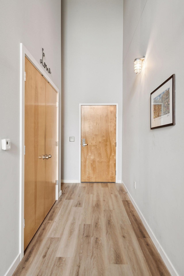 1829 3rd Ave S Unit 212, Minneapolis, MN 55404 - hall with wood finished floors and baseboards