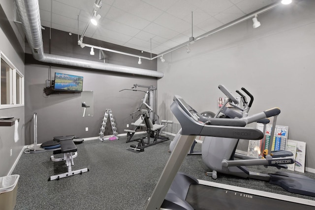 1829 3rd Ave S Unit 212, Minneapolis, MN 55404 - exercise room with rail lighting and baseboards