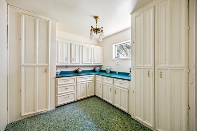 12975 185th St, Cold Spring, MN 56320 - kitchen featuring dark countertops and cream cabinets