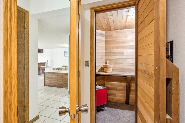 12975 185th St, Cold Spring, MN 56320 - relaxing sauna / steam room featuring tile patterned flooring, wood ceiling, and wooden walls