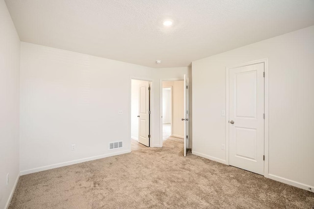 39685 Fallbrook Ave, North Branch, MN 55056 - unfurnished bedroom featuring carpet flooring and baseboards