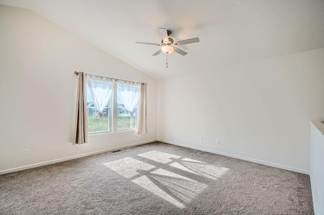 39685 Fallbrook Ave, North Branch, MN 55056 - empty room featuring carpet, vaulted ceiling, ceiling fan, and baseboards