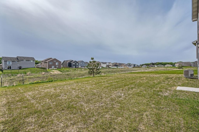 39685 Fallbrook Ave, North Branch, MN 55056 - view of yard featuring a residential view and central AC unit