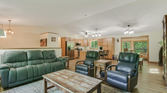3015 Aspen Ter, Scott Twp, WI 54830 - living area with light wood finished floors, a chandelier, lofted ceiling, and ceiling fan