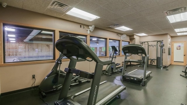 3015 Aspen Ter, Scott Twp, WI 54830 - gym with a paneled ceiling and baseboards