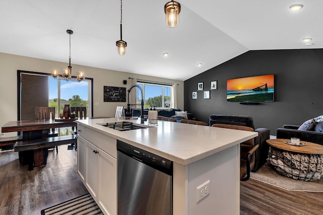 419 Bluebird Dr NW, Isanti, MN 55040 - kitchen with appliances with stainless steel finishes, dark wood finished floors, open floor plan, vaulted ceiling, and white cabinetry