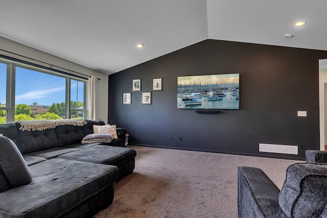 419 Bluebird Dr NW, Isanti, MN 55040 - carpeted living room with lofted ceiling, recessed lighting, and baseboards