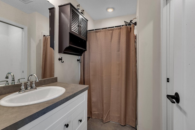 419 Bluebird Dr NW, Isanti, MN 55040 - bathroom featuring vanity and a shower with shower curtain