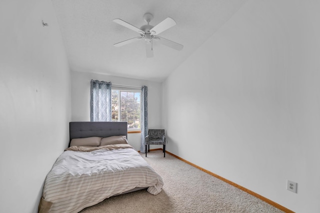 2225 Ranchview Ln N Unit 1, Plymouth, MN 55447 - bedroom featuring vaulted ceiling, carpet, and ceiling fan