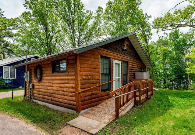 30124 Circle Dr, Breezy Point, MN 56472 - view of property exterior featuring a yard