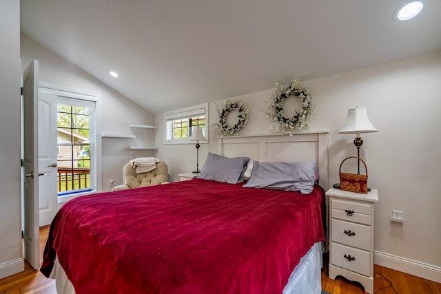 30124 Circle Dr, Breezy Point, MN 56472 - bedroom with wood finished floors, vaulted ceiling, baseboards, and recessed lighting