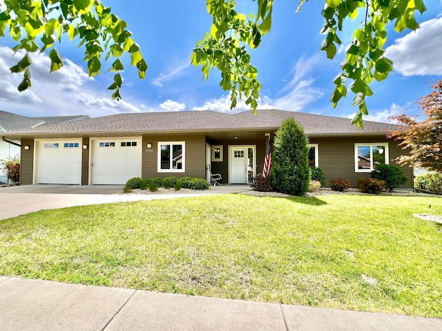 2774 Pine Ridge Blvd, Red Wing, MN 55066 - ranch-style house featuring an attached garage, concrete driveway, and a front lawn