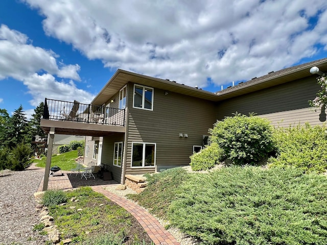 2774 Pine Ridge Blvd, Red Wing, MN 55066 - back of house with a patio area and a wooden deck