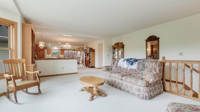 9020 120th Ave, Tilden Twp, WI 54724 - living area featuring a chandelier, light carpet, and baseboards