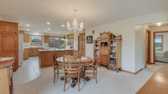 9020 120th Ave, Tilden Twp, WI 54724 - dining room featuring a chandelier, recessed lighting, light carpet, and baseboards