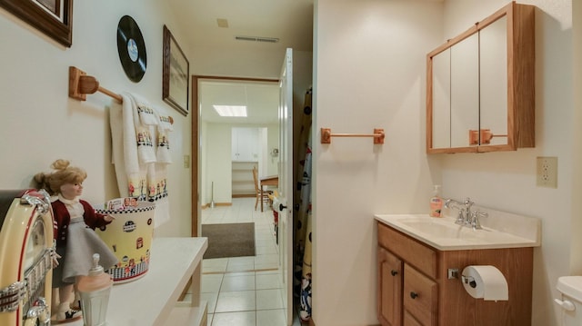 9020 120th Ave, Tilden Twp, WI 54724 - bathroom with tile patterned flooring, toilet, and vanity