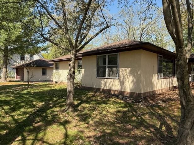 510 2nd Ave NW, Milaca, MN 56353 - view of side of home with a yard