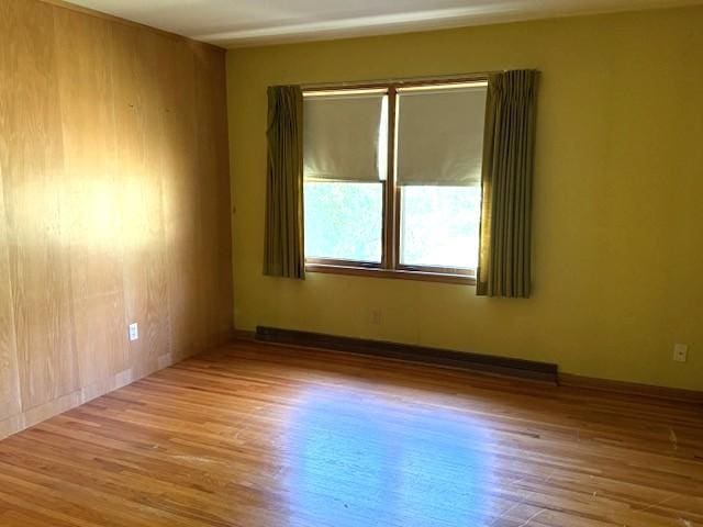 510 2nd Ave NW, Milaca, MN 56353 - unfurnished room featuring wood finished floors