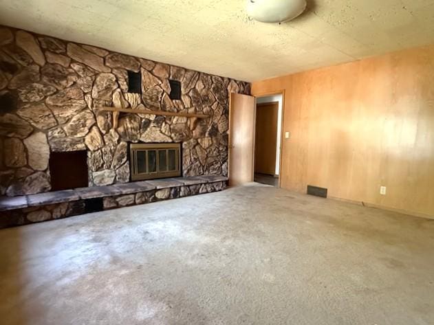 510 2nd Ave NW, Milaca, MN 56353 - unfurnished living room with a stone fireplace