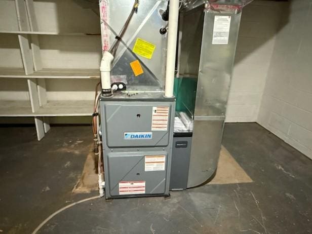 510 2nd Ave NW, Milaca, MN 56353 - utility room with heating unit
