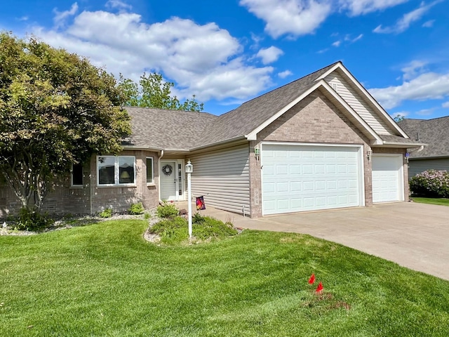 964 Aurora Cir, Red Wing, MN 55066 - ranch-style home with an attached garage, concrete driveway, a front yard, brick siding, and a shingled roof