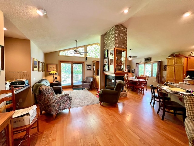 964 Aurora Cir, Red Wing, MN 55066 - living room with ceiling fan, lofted ceiling, plenty of natural light, light wood-style flooring, and recessed lighting