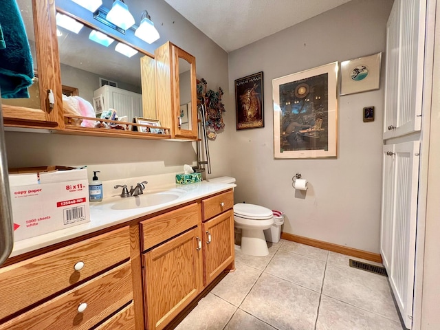 964 Aurora Cir, Red Wing, MN 55066 - bathroom with vanity, tile patterned floors, toilet, and baseboards