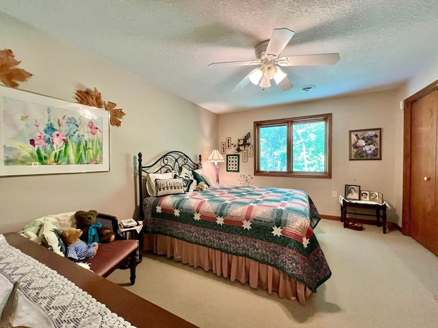 964 Aurora Cir, Red Wing, MN 55066 - bedroom with carpet flooring, ceiling fan, a textured ceiling, and baseboards