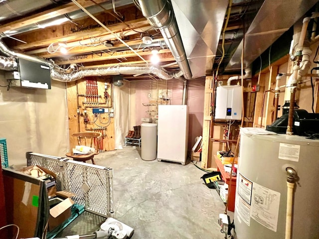 964 Aurora Cir, Red Wing, MN 55066 - unfinished basement with water heater, a water softener, and freestanding refrigerator