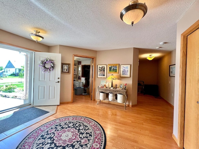 964 Aurora Cir, Red Wing, MN 55066 - entryway featuring light wood-style floors and a textured ceiling