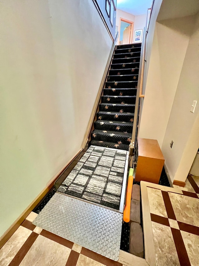 964 Aurora Cir, Red Wing, MN 55066 - staircase with inlaid floor details and baseboards