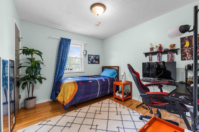 4065 Jersey Ave N, Crystal, MN 55427 - bedroom with wood finished floors and baseboards