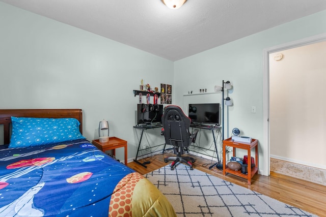 4065 Jersey Ave N, Crystal, MN 55427 - bedroom featuring wood finished floors and baseboards