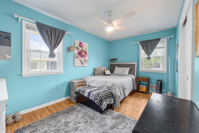 4065 Jersey Ave N, Crystal, MN 55427 - bedroom with wood finished floors and ceiling fan