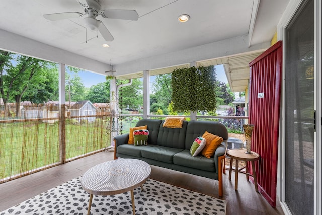 4065 Jersey Ave N, Crystal, MN 55427 - sunroom featuring ceiling fan, plenty of natural light, and an outdoor living space