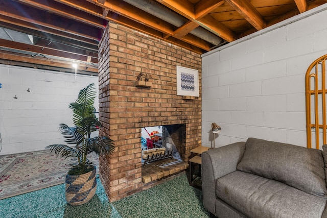 4065 Jersey Ave N, Crystal, MN 55427 - carpeted living area with an outdoor brick fireplace and concrete block wall