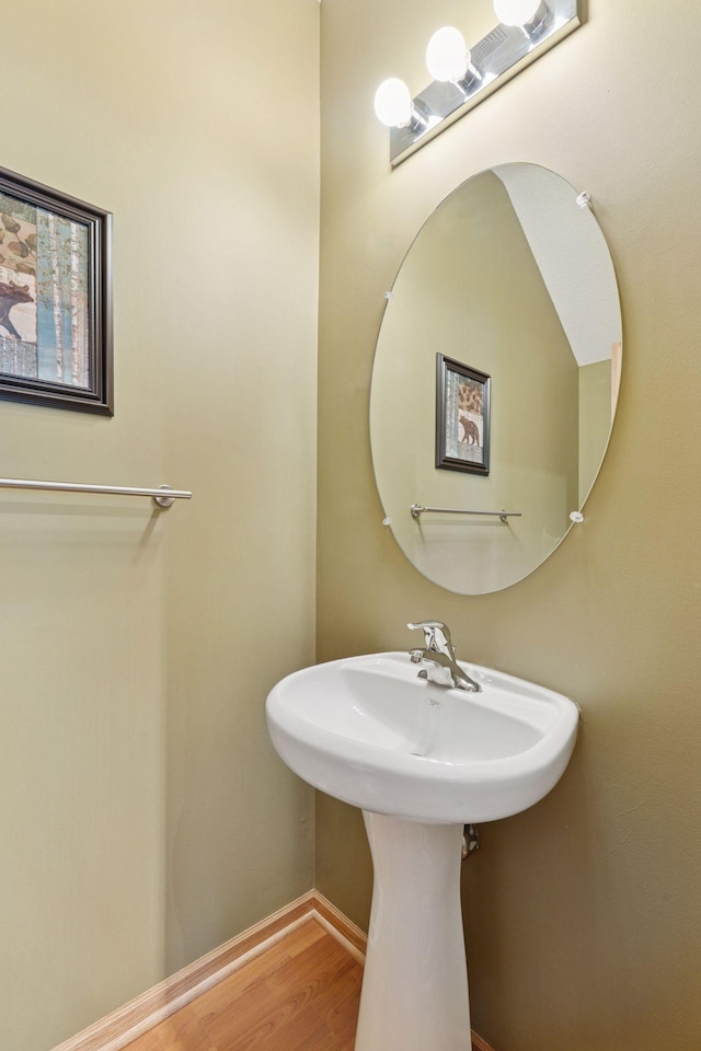 18571 98th Ave N, Maple Grove, MN 55311 - bathroom with wood finished floors, baseboards, and a sink