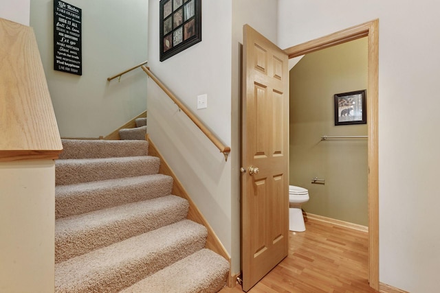 18571 98th Ave N, Maple Grove, MN 55311 - staircase featuring wood finished floors and baseboards