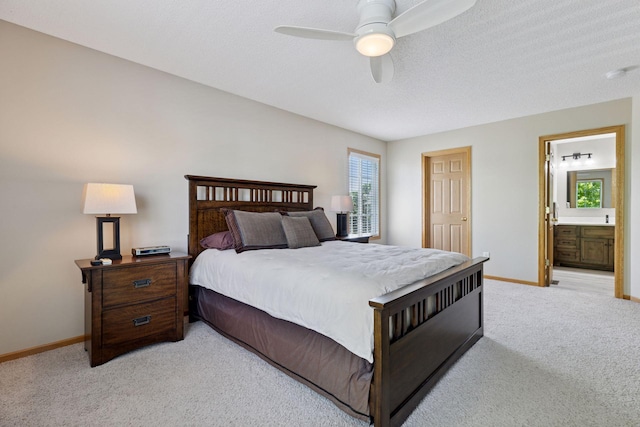 18571 98th Ave N, Maple Grove, MN 55311 - bedroom with light colored carpet, baseboards, and connected bathroom
