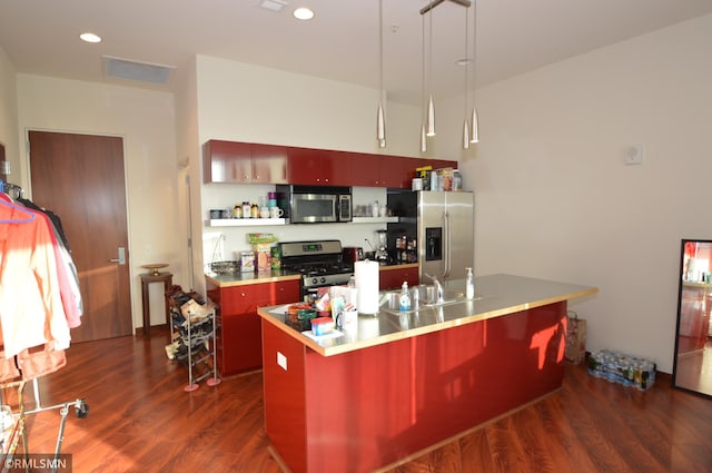 5601 Smetana Dr Unit 518, Minnetonka, MN 55343 - kitchen featuring stainless steel appliances, a sink, dark wood finished floors, a breakfast bar area, and open shelves