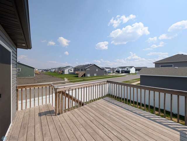 1506 67th Ave S, Fargo, ND 58104 - wooden deck with a residential view