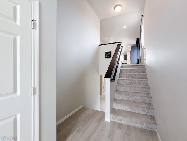1506 67th Ave S, Fargo, ND 58104 - stairway featuring wood finished floors, recessed lighting, and baseboards