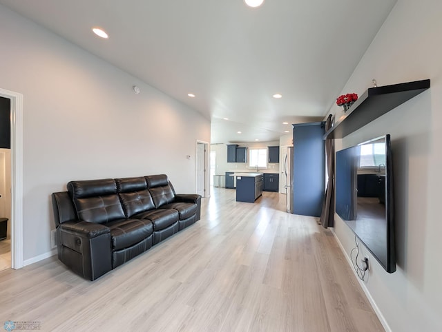 1506 67th Ave S, Fargo, ND 58104 - living area with recessed lighting, light wood-type flooring, and baseboards