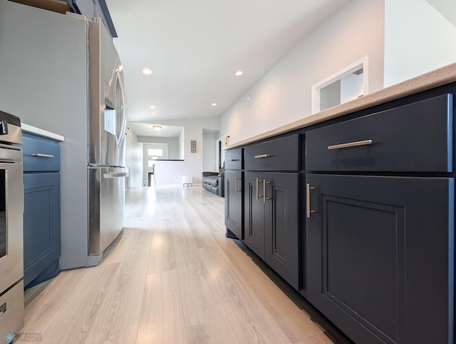 1506 67th Ave S, Fargo, ND 58104 - hallway with light wood-style flooring and recessed lighting