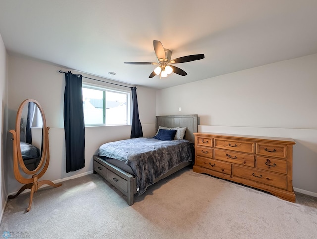 1506 67th Ave S, Fargo, ND 58104 - carpeted bedroom with a ceiling fan and baseboards