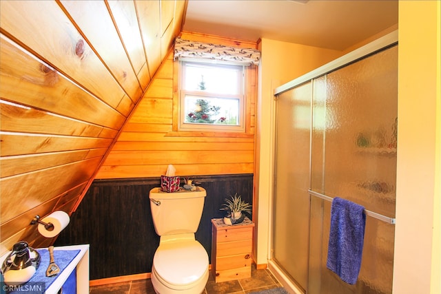 66893 185th Pl, Jacobson, MN 55752 - bathroom with wooden walls, a shower stall, and toilet